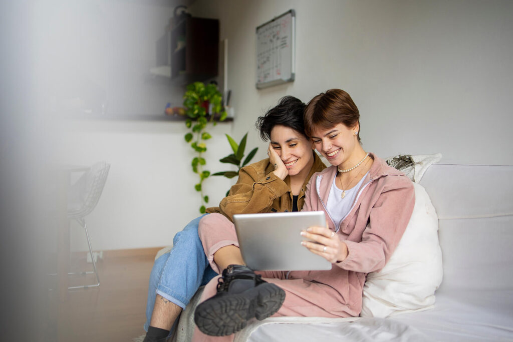 females on couch looking for mortgage assistance options